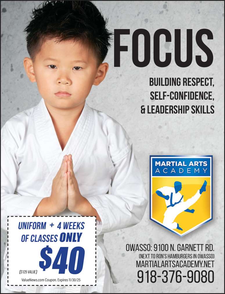 Young boy developing focus while practicing martial arts.
