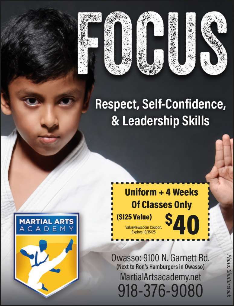 Young boy practicing martial arts.