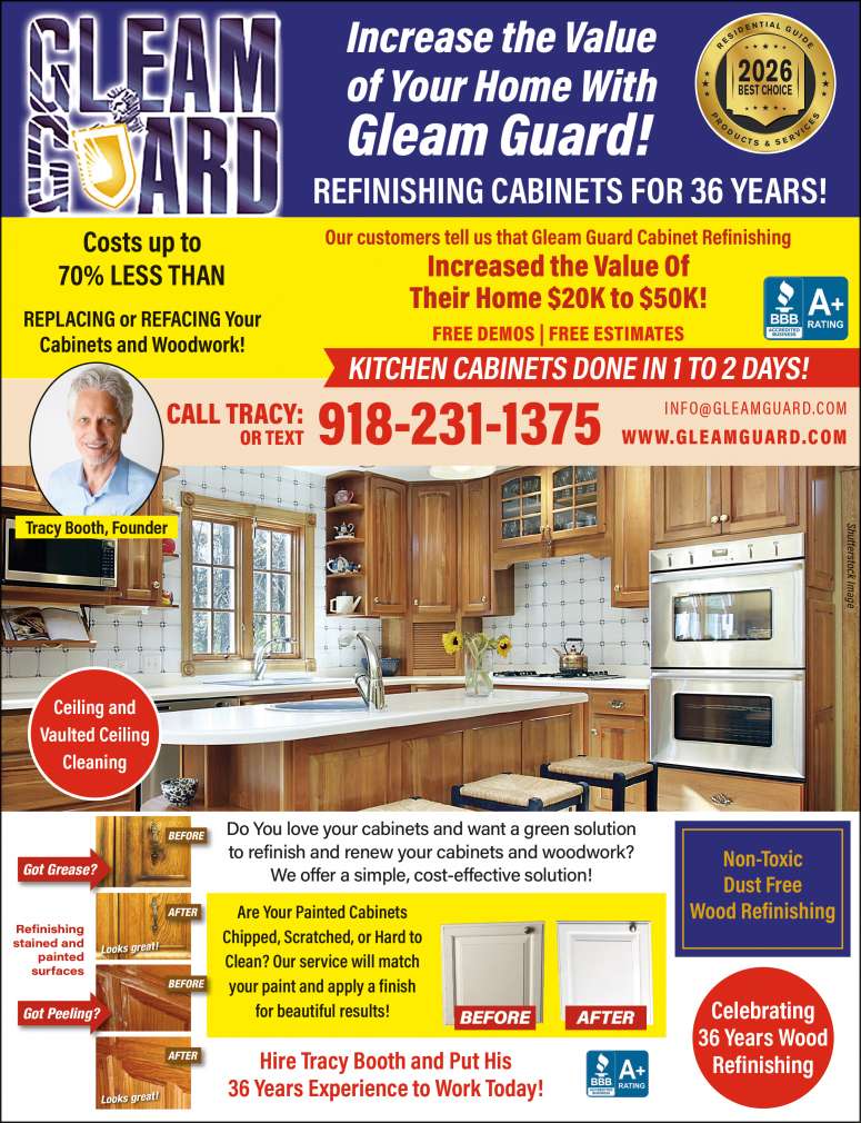 A beautiful kitchen with sparkling oak cabinets refinished by Gleam Guard.
