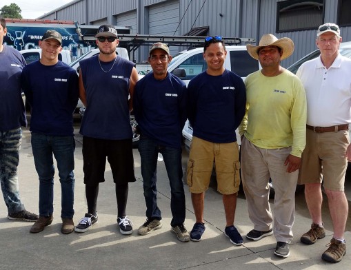 Rain Guard Owner David Buttenhoff (far right) with his Team of highly skilled and trained Crew Chiefs at the 8,000 sq. ft. Rain Guard Warehouse and Office Complex.