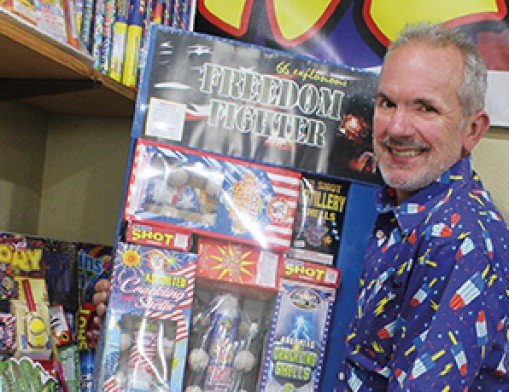 Matt Hiller, co-owner of The Castle of Muskogee, displays a bountiful family packs from The Castle. Value News and Values, Inc. photos, June 2025.