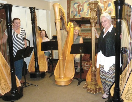 Harpists take a break from practicing for the Midwest Harp Festival.