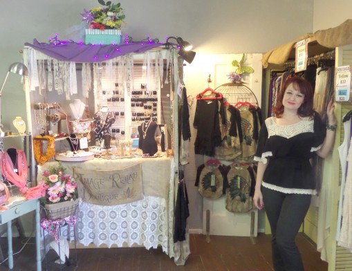 Heather Lyons, store hostess, beside an already wonderfully outfitted booth at Storehouse Front.