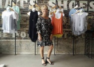 Cindy Rickard shows off the new Free People line now available at The District on Main.