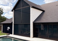 High-end enclosures pair durable materials with a refined, upscale finish. Photo courtesy of American Patio Enclosures, October 2026.