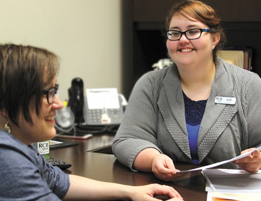 Research lenders to find the right one for you. Pictured is 
Rachel Strange speaking to RCB Bank Mortgage Specialist Jodi Troyer.