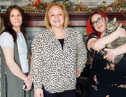 The caring hearts at Angel&rsquo;s Pet Funeral Home and Crematory are Michelle Storey, Angel Askins, Jessie Rogers holding Leroy, and Crosby who is Angel&rsquo;s faithful Bernese Mountain dog. 
Value News VN Magazine and Values Inc. photo, April 2026.