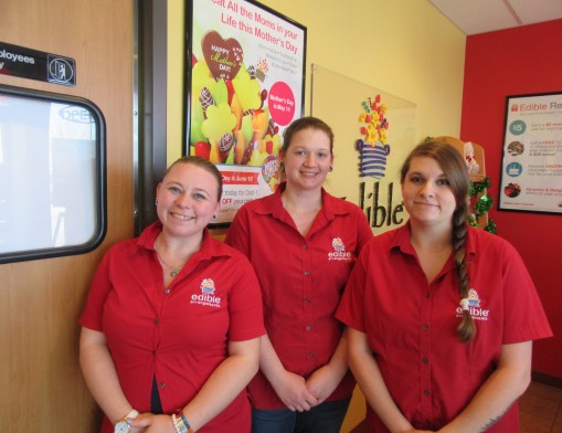 Pictured left to right: Edible Arrangement store managers include Brandi Nix from the 91st and Memorial store, Morgan Skaggs from the the Owasso store,  and Natalie Hawkins from the 33rd & Peoria store.