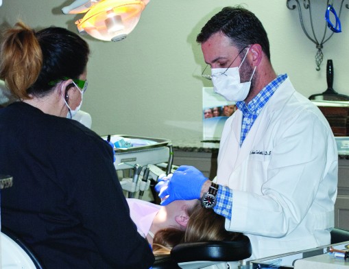 Dr. Andrew Carletti and a student during training at Dental Careers of Tulsa.