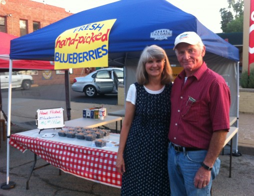 Gwen and Gerald Gay, owners of Huldy’s Farm, at the Cherry Street Farmers Market in 2012.