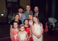 Michael Urie (far right) is surrounded by his daughters and nieces at the 2018 dance.