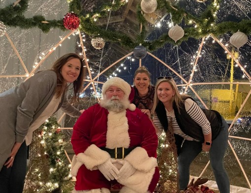 Photo-op with Santa during a community
favorite event.