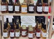 A scrumptious variety of jams, jellies, vinegars, and chutneys will be available. Photo courtesy of Tulsa Herb Society.