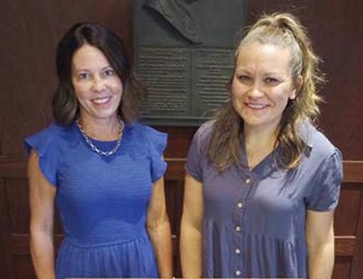 Cari Bohannan, left, is the Festival of Trees Committee Chair, and Jody Moore, right, is the Executive Director of Safenet Services.
