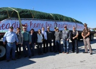 Picture from left to right are City Manager Jim Thomas, Tanya Andrews, Pelco Structural driver Joe, Kathy Thomas, Public Works Administrator with City of Claremore Jonah Humes, Lisa Rogers, employees of City of Miami Electric Department, and 2 OHP officers that helped escort the tree to Claremore.