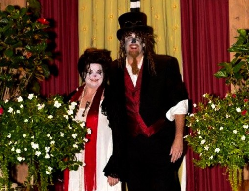 Melanie Hasty-Grant and husband Ken Grant dressed as in corrolation with their Freak Show theme at their 2015  Halloween Haunted Mansion, sponsored each year by Waterstone Private Wealth Management.