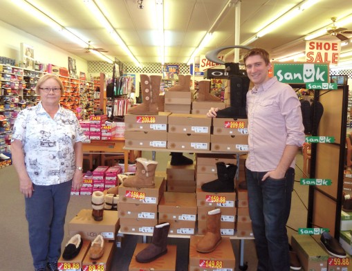 Mary Ellenburg and Jason Skinner by the UGG selection at Felts.