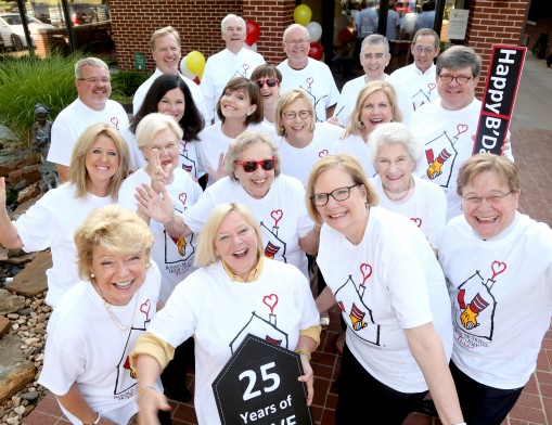 Former board presidents and volunteers of Ronald McDonald House of Tulsa are all smiles preparing for the big celebration.