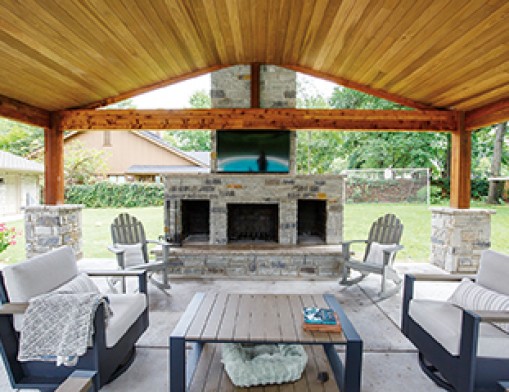 Outdoor fireplaces add a relaxing touch to the backyard. 
Actual photo of a Cornerstone Chimneys complete outdoor living space job. VN Value News Magazine & Values, Inc. photo, December 2025.