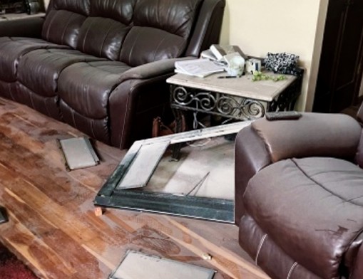The experience of a severe weather event can be overwhelming. For example, a Cornerstone Chimneys customer related that when lightning struck her chimney the glass fireplace doors were forced from its hinges flying across the room and striking her recliner. 
Photo courtesy of Cornerstone Chimneys, May 2026.