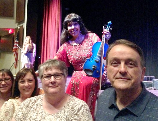 Board Member Kayla Butler, RCYS Office Manager Carolyn Swopes, therapist Raylene Stebbins and RCYS Executive Director Steve Blahut, with Jana Jae and her iconic electric blue fiddle.