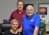 Fay Higinbotham, and owners Monte Whitaker and Ralph Higinbotham.