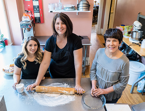 The Pink House is a family business.  Pictured left to right, Marketing Director Marybeth Pixley, mother-in-law Shari Beguin, and her mother, Owner Margo Stewart.