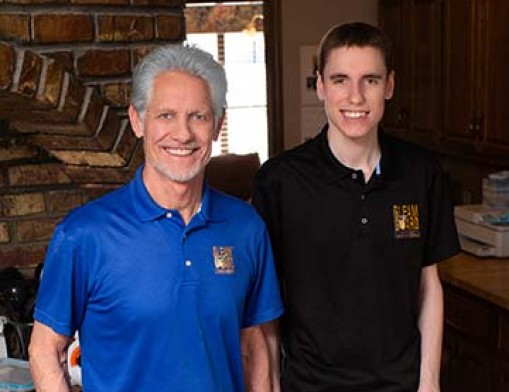 Tracy Booth, founder of Gleam Guard with his son Phillip.