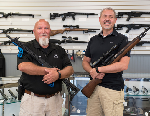 Owners, Andy Shidell with a custom built AR-15, and Danny Jones with a 1994 Springfield Armory M1A-A1 Bush Rifle.