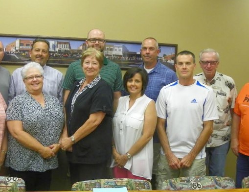 The Bluegrass and Chili Festival Committee, gearing up for the big weekend: TOP LEFT: Russ Wells, Bruce Smith, Eric Eaton, Jeff Barlow, Gary Baergen, Will Pfeiff BOTTOM LEFT: Candi Szpansky, Sherry Hinds, Dell Davis, Kathy Ricks, Matt Ricks NOT PICTURED: Audrey Schmidt, Pam Steffens, Don Gomez, Ron Bailey, Susan Thornton, Jeff Howell, Dave Chaussard, Larry Rahmeier, Sarah Fiegner.