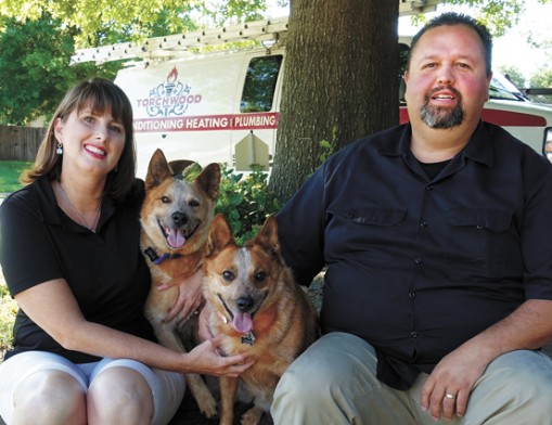 Torchwood Co-Owners Christi and Eric Danels with their Red Heeler companions, Zeus and Zoe.