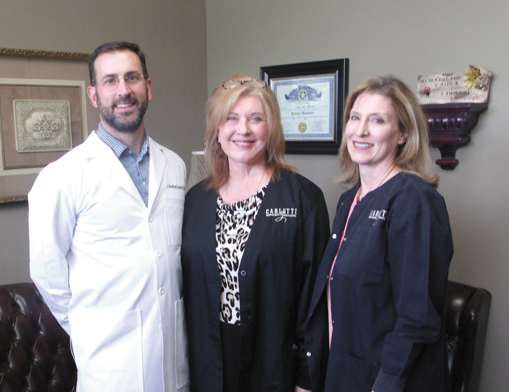 Dr. Andrew Carletti, Administrator Norma Tyler and Karen Summers offer a hands-on approach to training dental assistants.