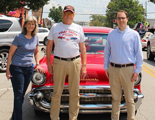 Get ready for family fun at the first annual Jenks Main Street Bash Festival & Car Show on Sept. 18. Pictured are Jim & Donna Grisham, Tulsa Chevy Classics Car Club and Lane Castleberry, Jenks Chamber of Commerce Director of Communications.