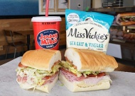 Subs ordered “Mike’s Way” are piled high with onions, tomatoes, vinegar, oil, and a special mix of spices. Make it a meal with Vickie’s chips and a drink!