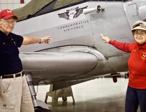 Donna and Jim Mills take a break from preparing for the 14th annual Hangar Dance. Jim emphasizes that this is the Spirit of Tulsa Squadron’s major fundraiser, and the couple invites anyone interested in aviation and honoring America’s veterans to come out and enjoy the evening.