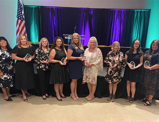 2020 Leading Ladies. L to R: Barby Myers, President/CEO Claremore Area Chamber of Commerce, Marti Jenkins (Community Supporter), Denise Rhames (Behind the Scenes), Reighly Hendrix (Rising Star), Courtney Castle (Leader in Health), Nancy Fitts (Non-Profit Leader), Mary Statton (Leader in Manufacturing), Abbie Starkey (Leader in Business), Meggie Froman-Knight (Leading Lady of the Year)