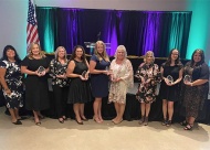 2020 Leading Ladies. L to R: Barby Myers, President/CEO Claremore Area Chamber of Commerce, Marti Jenkins (Community Supporter), Denise Rhames (Behind the Scenes), Reighly Hendrix (Rising Star), Courtney Castle (Leader in Health), Nancy Fitts (Non-Profit Leader), Mary Statton (Leader in Manufacturing), Abbie Starkey (Leader in Business), Meggie Froman-Knight (Leading Lady of the Year)