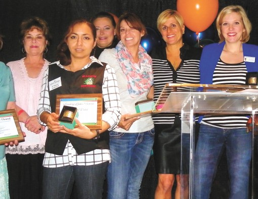 Leading Ladies award recipients (L to R): Barbara Stafira, Angie Graves, Chantal Vidal, Dr. Melinda Steelmon, Rhonda Bear, Jill Donovan, presenter, Alyson Short and Celina Davis 
(accepting for Mendy Stone, who was out of the country).