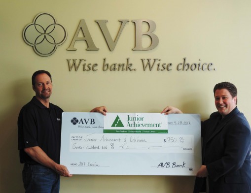 AVB Bank President and CEO, Ted Cundiff, presents a $750 donation to Junior Achievement (JA).