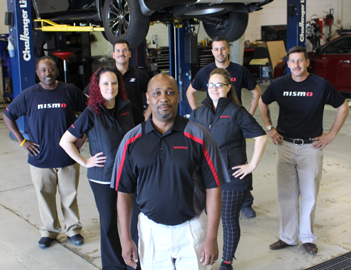 (Front) Service Director Mike Rener. (2nd Row) Cashiers Stephanie and Andrea. (3rd Row) Service Advisors Demario, Weston, Steven and Steve.