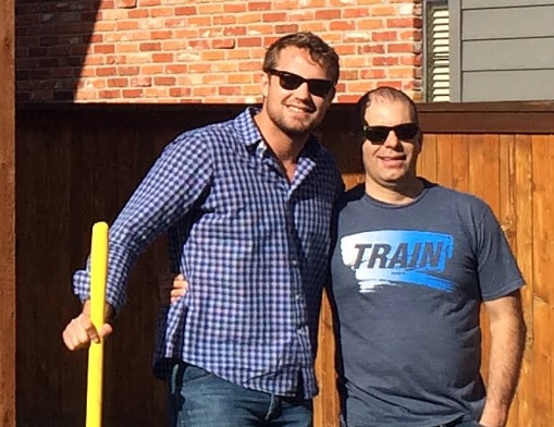 Outdoor Creations owner Jake Nicks at a job site with his father.