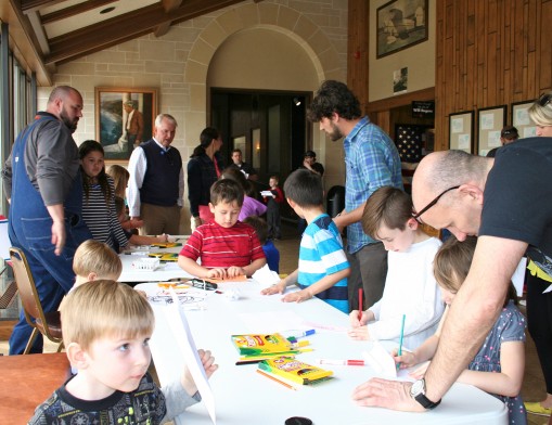 It was a family endeavor during last year’s Spring Break at Will Rogers Memorial Museum as fathers helped create 
paper airplanes for a launching.