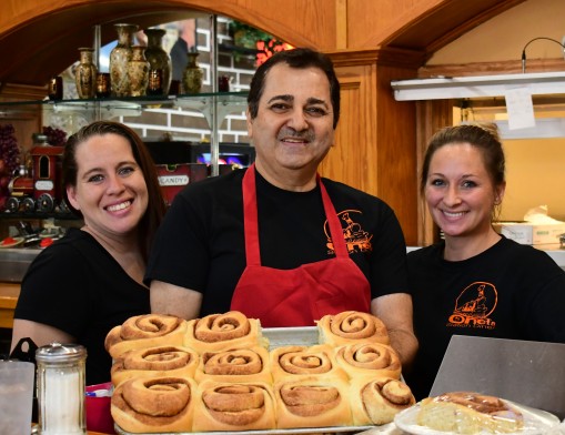 Chelsea, Mike, and Summer invite you to join them any day for big-as-your-face cinnamon rolls, fresh from the oven!