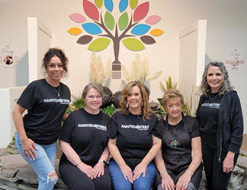 Photo caption:  (L to R) Christi Jamie, Teresa Morrison, Cheryl Cotton, Linda Daniel, and Jacque Orriols at the Painted Tree Boutique