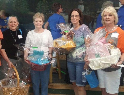 2018 Bunco winners take home baskets loaded with donated prizes.