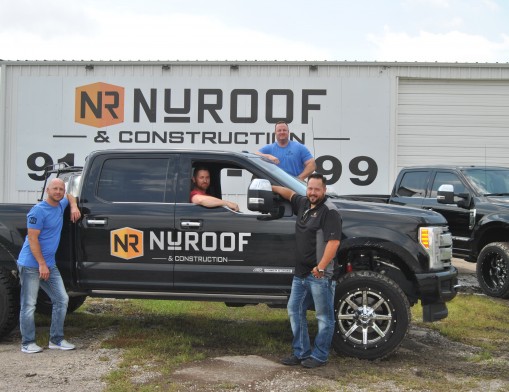 NuRoof Partners (left to right) Cass Benner, Ricky Stanley, Brad Parson (in truck) and Chris Merriott.