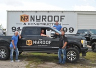 NuRoof Partners (left to right) Cass Benner, Ricky Stanley, Brad Parson (in truck) and Chris Merriott.