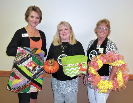 Michelle Bonicelli, Kathy Erwin, and Julaine Farless show some of the items you can learn to make at the Happy Holiday Gift Ideas event.