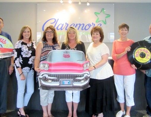 The benefit committee of Rogers County Youth Services shows their enthusiasm for this year’s theme (L to R):  Steve Blahut, Carolyn Swopes, Donna Harrington, Cyndi Robinson, Angie Graves, Debbie Butler and Jim Spangler.