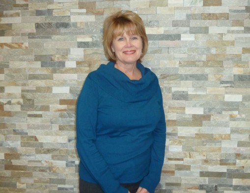 Tia Stout of OklaHomes Realty, in their newly renovated office.